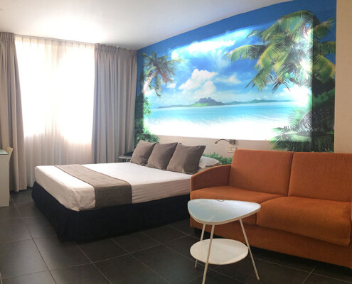 Habitación playa con palmeras